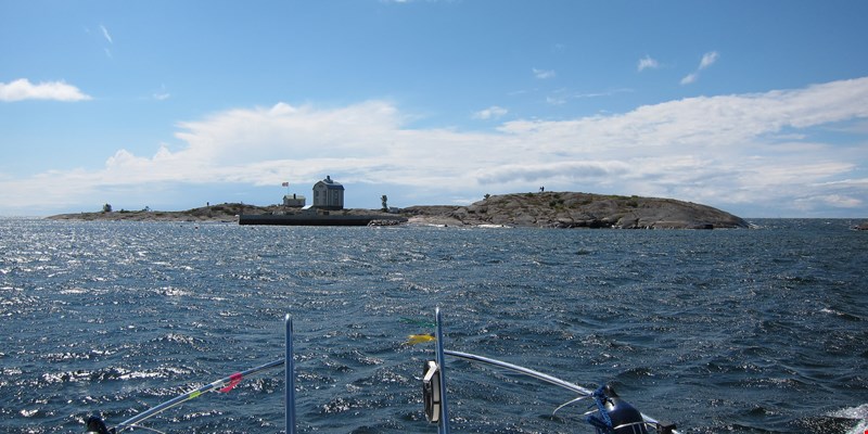 Motor boat at blue Baltic Sea on a beautiful sunny day, Aland, Finland.