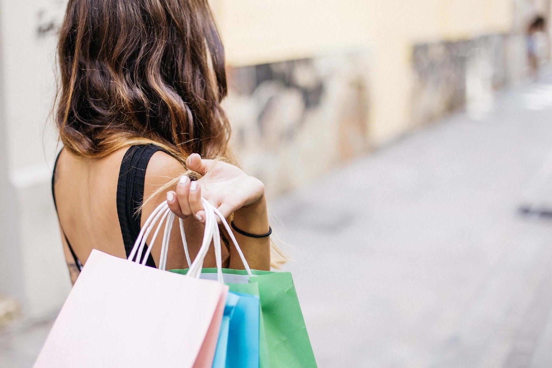 woman carrying shopping bags
