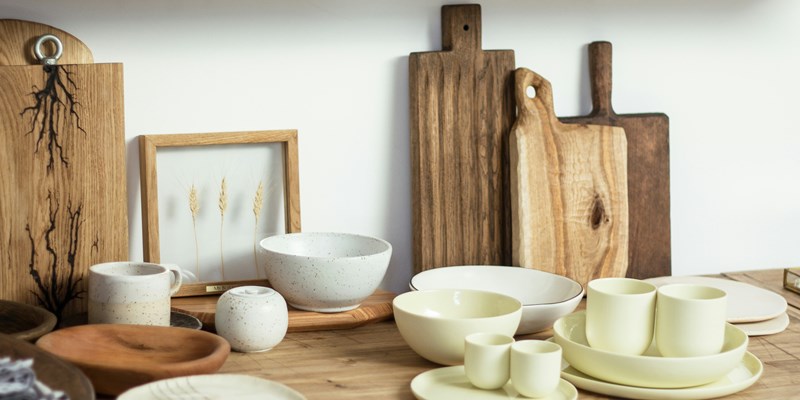 white ceramic bowls on brown wooden table