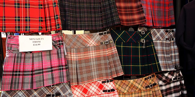 Scottish kilts on display outside the shop in Edinburgh, Scotland